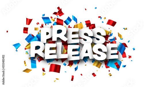 Press release sign with colorful cut out foil ribbon confetti.