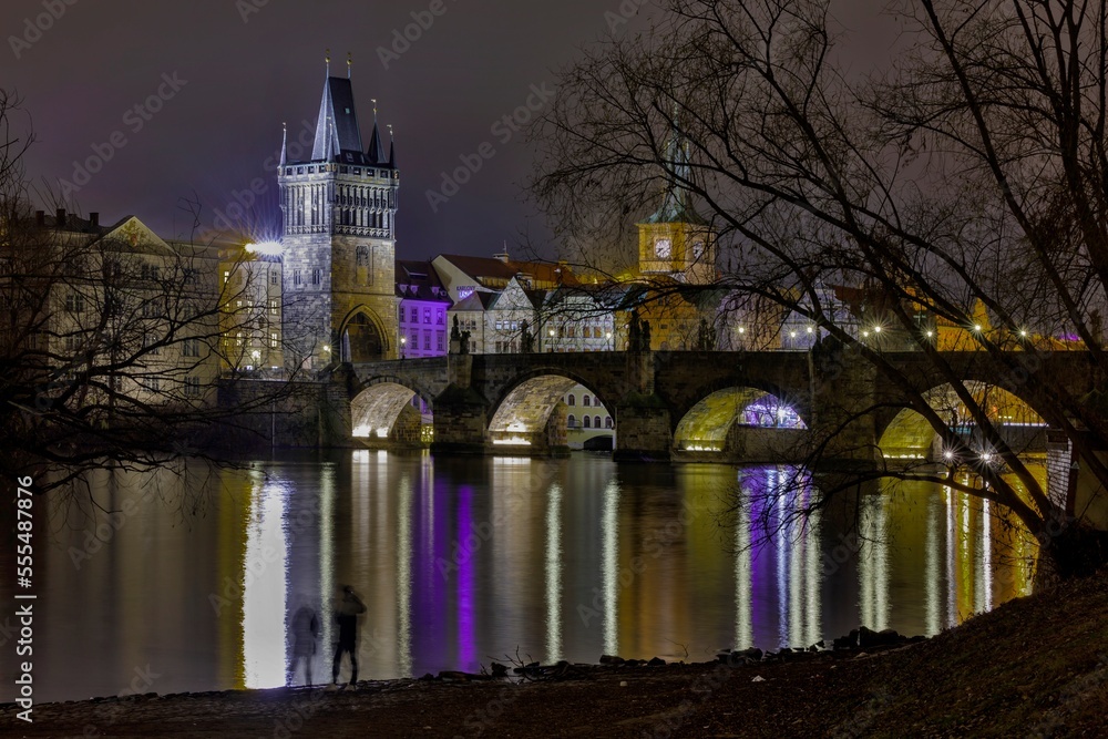 Naklejka premium Mystic Charles bridge at night and Vltava river in Prague