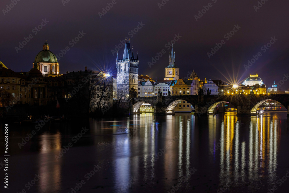 Mystic Charles bridge at night and Vltava river in Prague