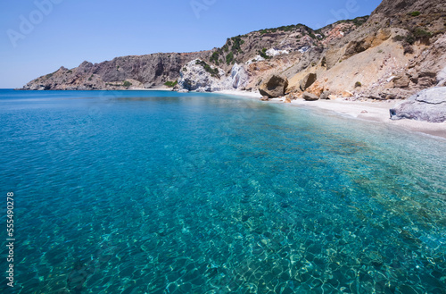 Turquoise ocean water along the coast of Galazia Nera Bay; Polyaigos Island, Cyclades, Greece photo