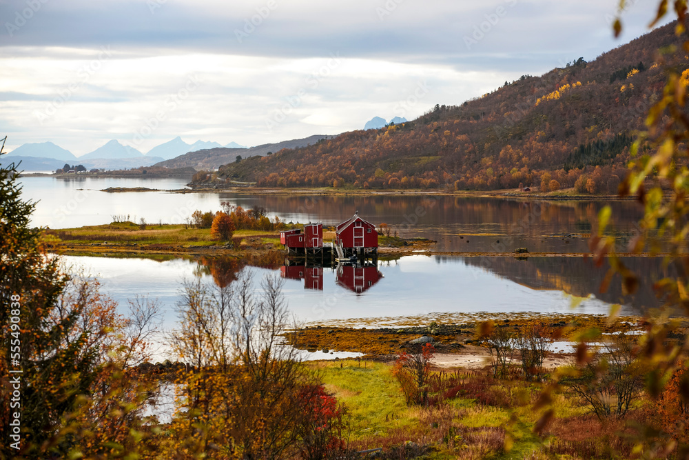 Red hut rorbu in small village on Lofoten, Norway. Autumn