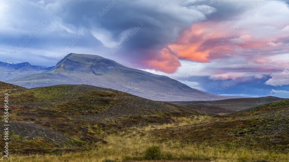 Landscape in Northern Iceland with glowing pink clouds at sunset; Hunaping vestra, Northwestern Region, Iceland Landscape in Northern Iceland with glowing pink clouds at sunset; Hunaping vestra, Northwestern Region, Iceland