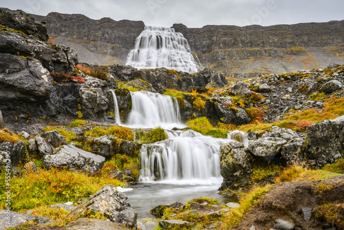 Dynjandi (also known as Fjallfoss) is a series of waterfalls located in the Westfjords, Iceland. The waterfalls have a total height of 100 metres; Isafjaroarbaer, Westfjords, Iceland photo