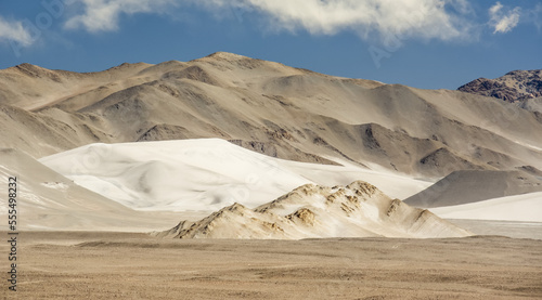 Panoramic landscape of high altitude desert with sand, hills and mountains in the Andes; Antofagasta de la Sierra, Catamarca, Argentina