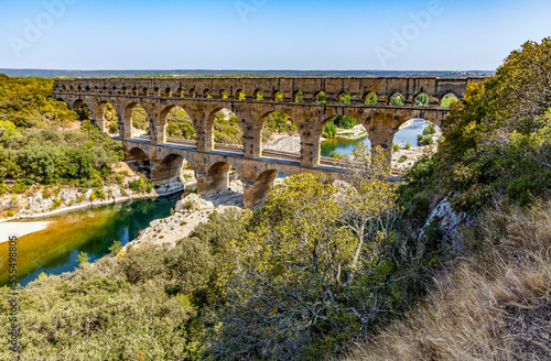 View of the ancient Roman aqueduct bridge, Pont du Gard; Gard, France photo