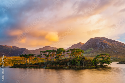 A dramatic sunrise over Derryclare Lough; Connemara, County Galway, Ireland photo