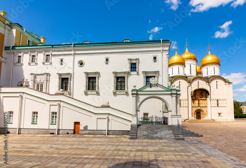 Sobornaya square of Moscow Kremlin with cathedral of Dormition (Uspensky Sobor) and palace of Facets (Granovitaya Palata), Russia