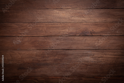 Fototapeta Naklejka Na Ścianę i Meble -  Vintage brown wood background texture with knots and nail holes. Old painted wood wall. Brown abstract background. Vintage wooden dark horizontal boards.