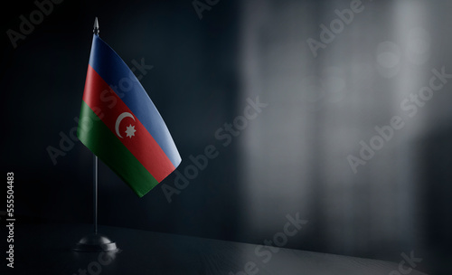 Small national flag of the Azerbaijan on a black background