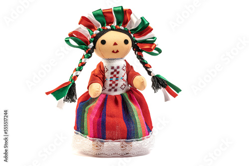 Colorful traditional Mexican rag handmade doll isolated in white.
Doll with long braids and ribbons using the colors of the Mexican flag.
