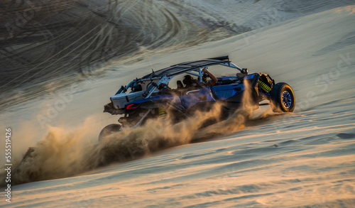 Fototapeta Naklejka Na Ścianę i Meble -  Custom made desert car bashing sand dunes in Doha, Qatar