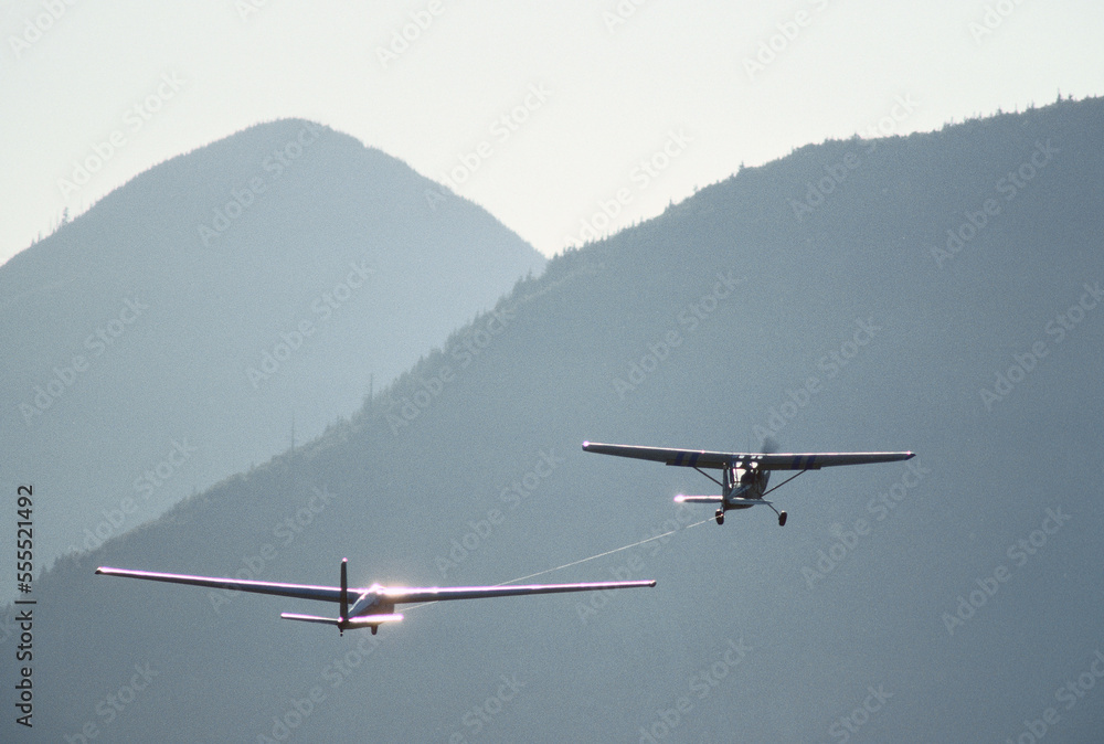 Glider Being Towed by Airplane Glider Being Towed by Airplane