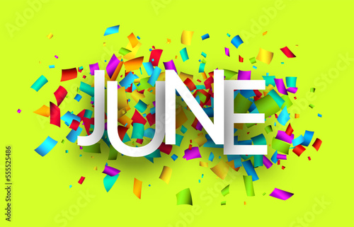 June word over colorful cut out ribbon confetti background.