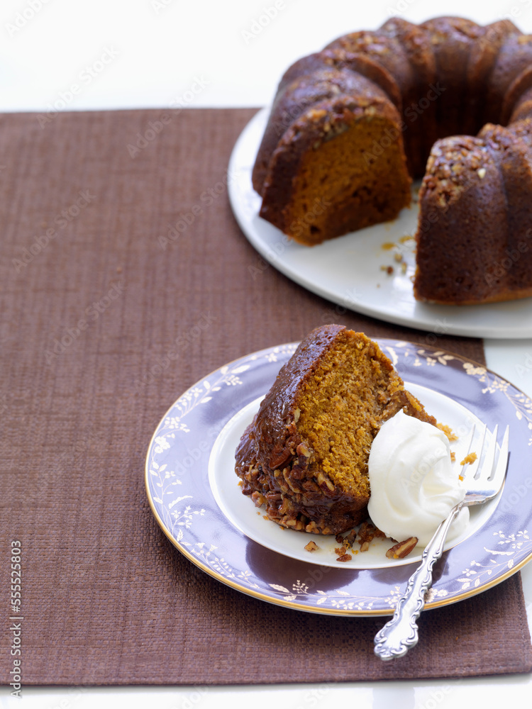 Slice of Pumpkin Cake with Whipped Cream Slice of Pumpkin Cake with Whipped Cream