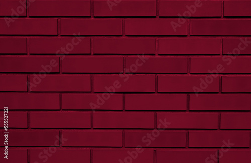 Viva magenta textured background of brick wall
