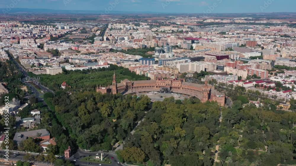 Aerial shot of an old historical European city in Seville Spain in summer on a sunny day. flight over the park and squares of spain. Aerial shot of an old historical European city in Seville Spain in summer on a sunny day. flight over the park and squares of spain.