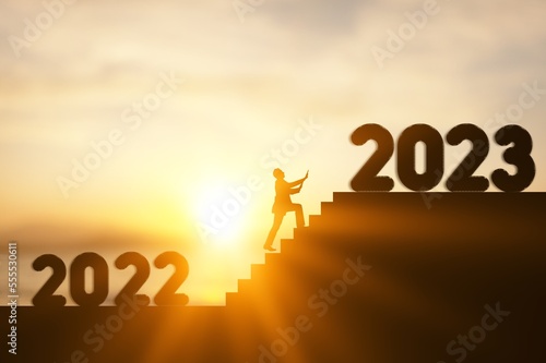 New year of 2023. Silhouette running on stairs.