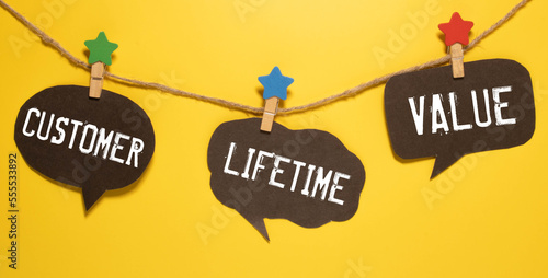 Фотография Hand writing Customer Lifetime Value with marker, concept background