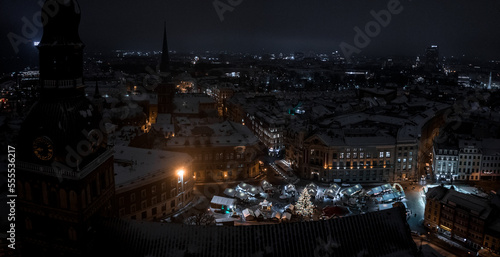 Aerial night view of the winter Riga old town - the capital of Latvia. Beautiful winter over Riga.