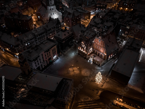 Aerial night view of the winter Riga old town - the capital of Latvia. Beautiful winter over Riga.