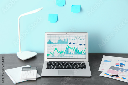 Laptop with stock data, lam...