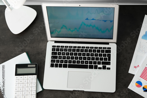 Laptop with stock data, cal...
