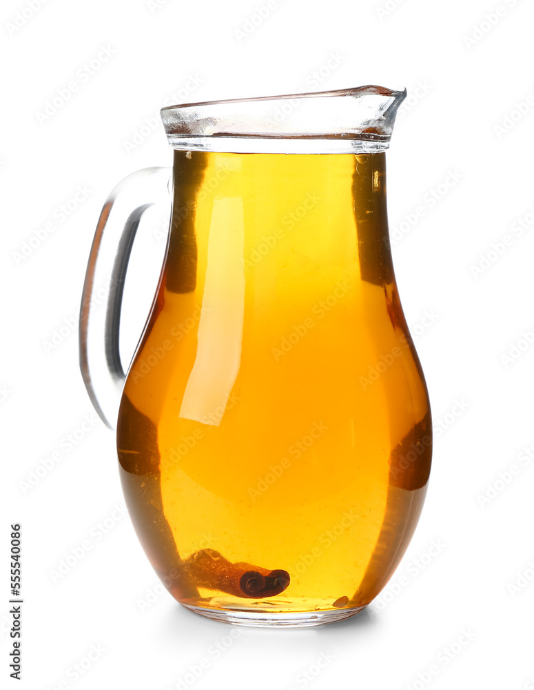 Glass jug of fresh apple juice on white background Glass jug of fresh apple juice on white background