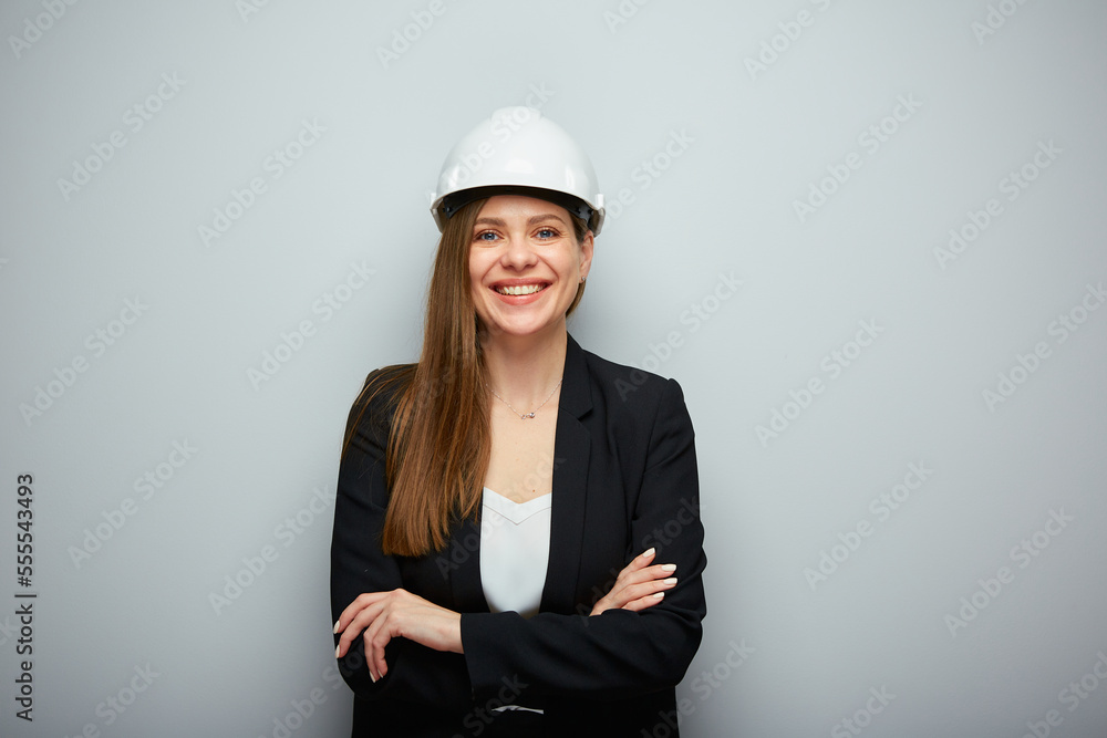 Woman engineer in white helmet and black suit. Isolated female portrait. Woman engineer in white helmet and black suit. Isolated female portrait.
