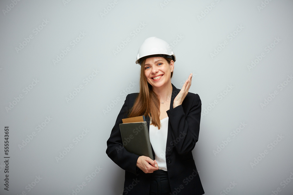 Woman student architect or engineer profession standing with book. Woman student architect or engineer profession standing with book.