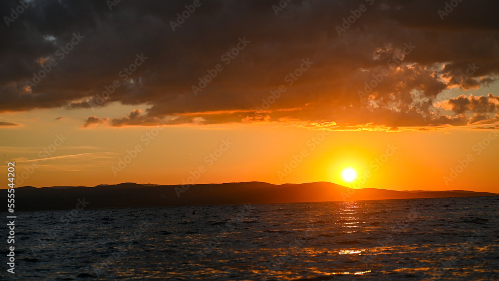 Beautiful sunset at the sea in summer. Beautiful sunset at the sea in summer.