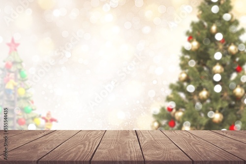 Wooden empty table and Christmas tree background