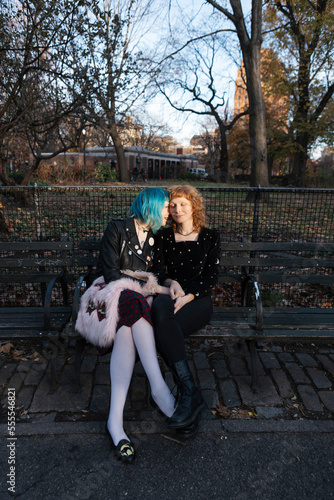 Wallpaper Mural unconventional lesbian couple embracing in urban park Torontodigital.ca