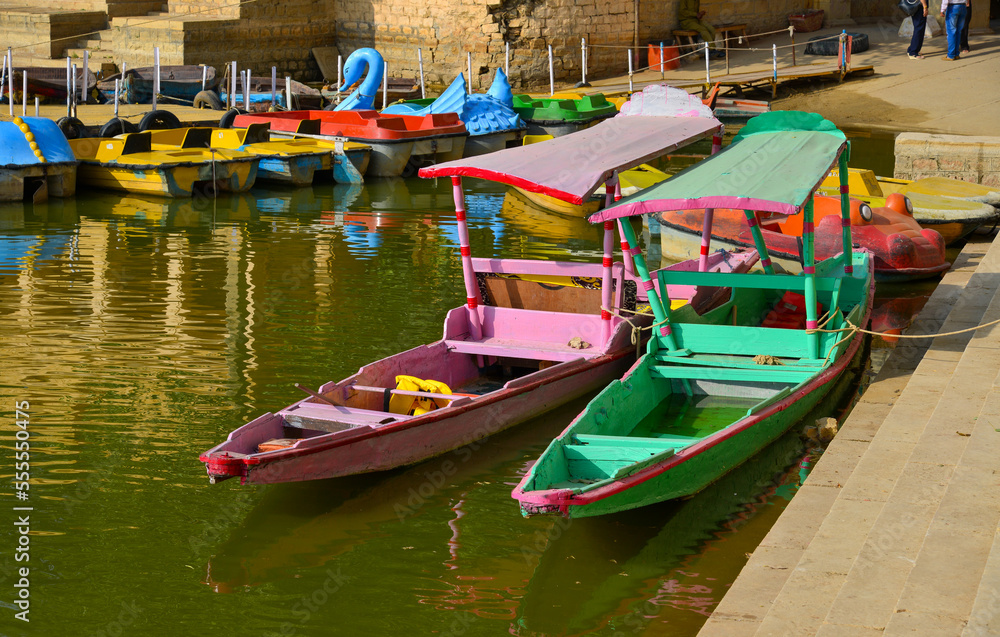 Wooden boats dock on the tourist jetty
