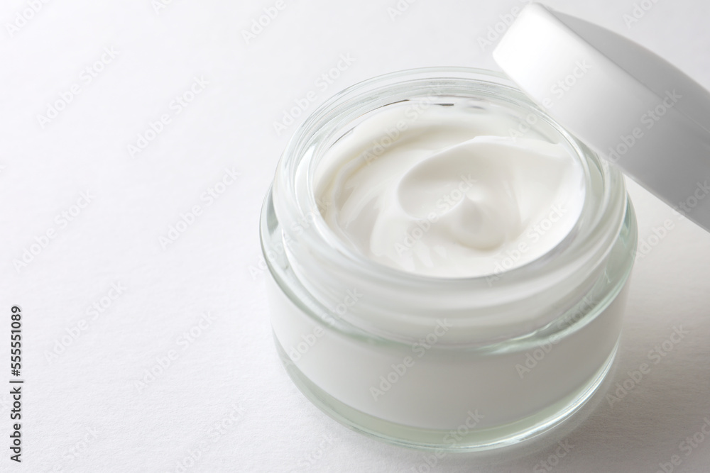 Jar of face cream on white background, closeup. Space for text Jar of face cream on white background, closeup. Space for text