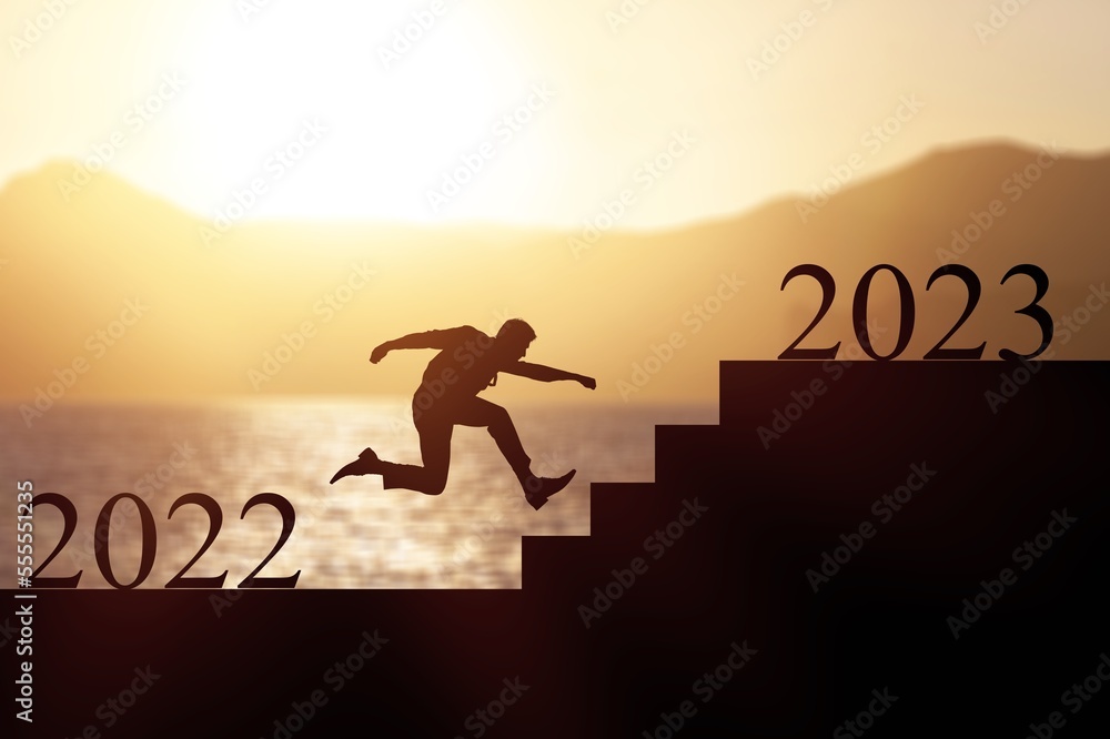 New year of 2023. Silhouette running on stairs. New year of 2023. Silhouette running on stairs.