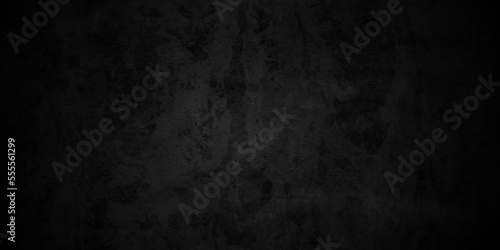 Black texture chalk board and black board background. stone concrete texture grunge backdrop background anthracite panorama. Panorama dark grey black slate background or texture © MdLothfor