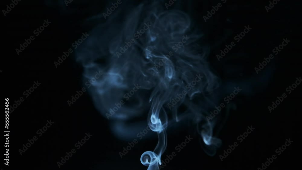 Smoke floating in the air on a black background Smoke floating in the air on a black background