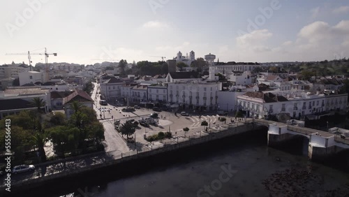 Touristic Square And Pedestrians Bridge Over Water Channel In Sunny Day, Tavira, Portugal