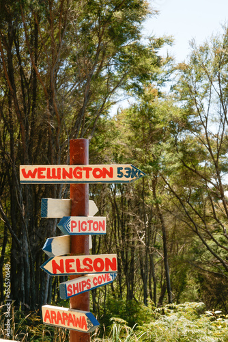 Rustic direction sign on Queen Charlotte Track