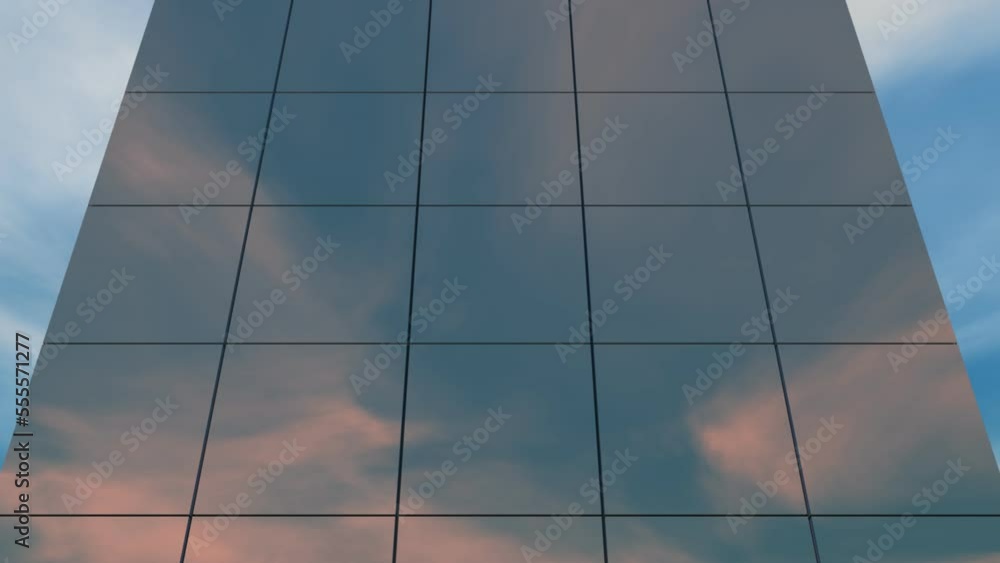 Clouds in a sunset sky reflecting off a building with the camera tilting up. Clouds in a sunset sky reflecting off a building with the camera tilting up.