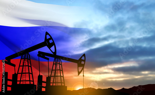 Silhouette of Oil pump. Industrial machine for petroleum on background of sunset. Russia Oil industry concept. EPS10 vector