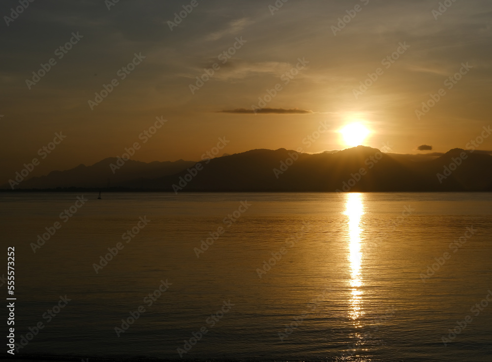 sunrise view in Banyuwangi, sunrise over the mountain, sunrise on the sea, sunrise on the beach, sunrise over Bali Island