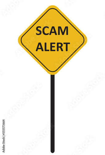 yellow road sign with text of Scam Alert