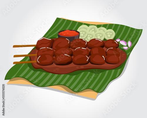 Delicious sate or satay with grilled meat traditional indonesian food served on banana leaf