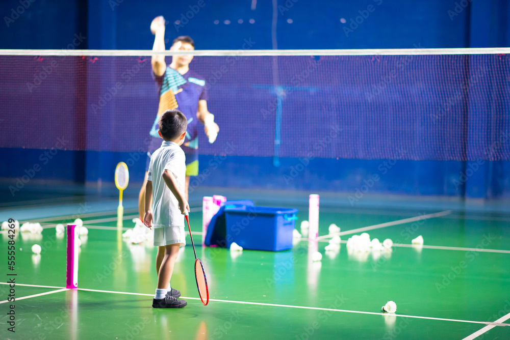 Boys training badminton indoor activitiy Boys training badminton indoor activitiy