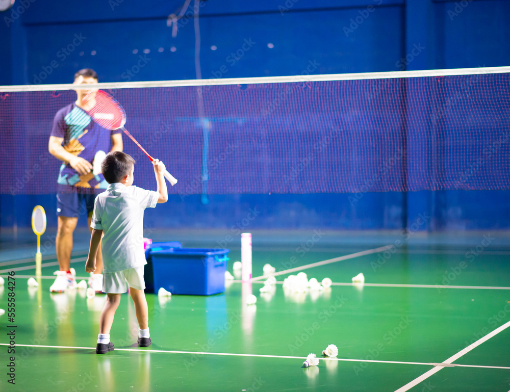Boys training badminton indoor activitiy Boys training badminton indoor activitiy