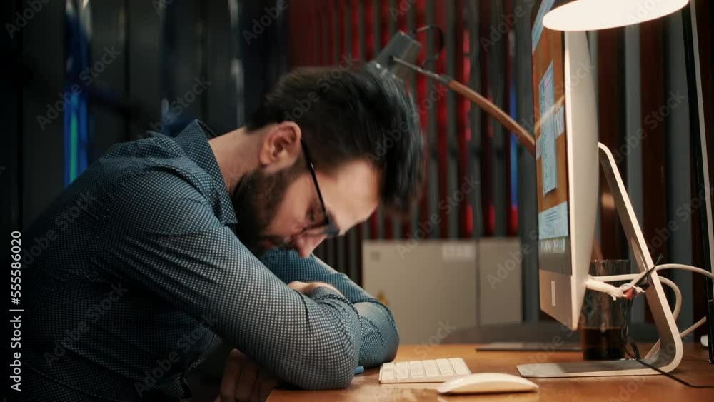 Tired businessman sleeping on workplace Tired businessman sleeping on workplace