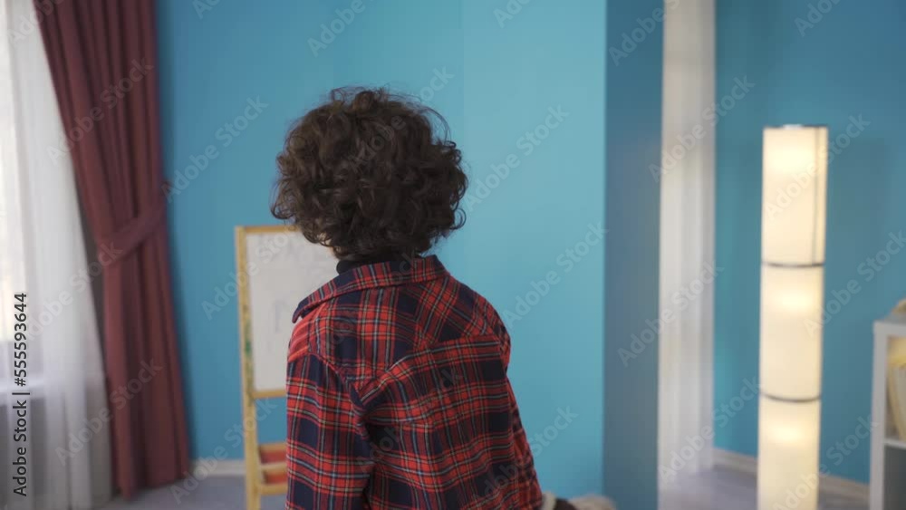 Bored unhappy boy at home looking out the window.
The boy who wants to go out and play outdoors is bored and unhappy at home.
Bored unhappy boy at home looking out the window.
The boy who wants to go out and play outdoors is bored and unhappy at home.