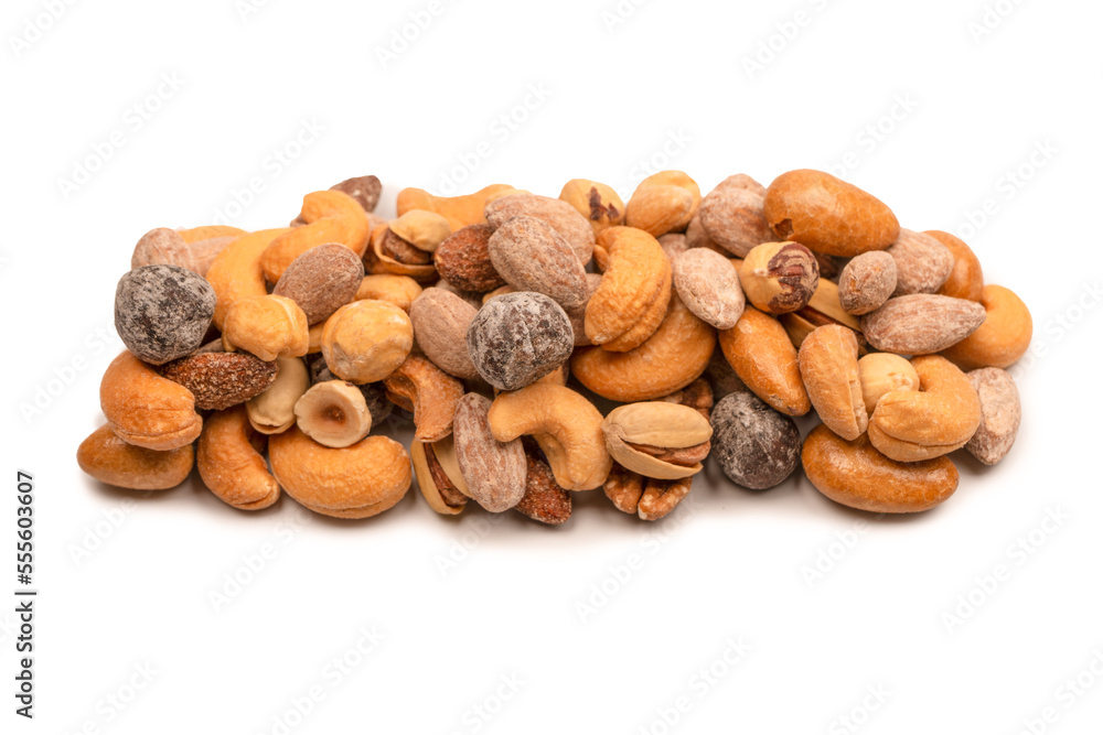 A group of almonds, pistachios, walnuts, macadamia, cashews. A group of almonds, pistachios, walnuts, macadamia, cashews.