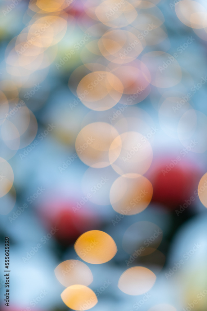 Obraz premium blurred background of neon christmas colored lights.